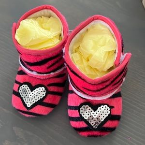 Hot pink zebra with glitter heart faux UGGs, 12 to 18 months. Brand new.